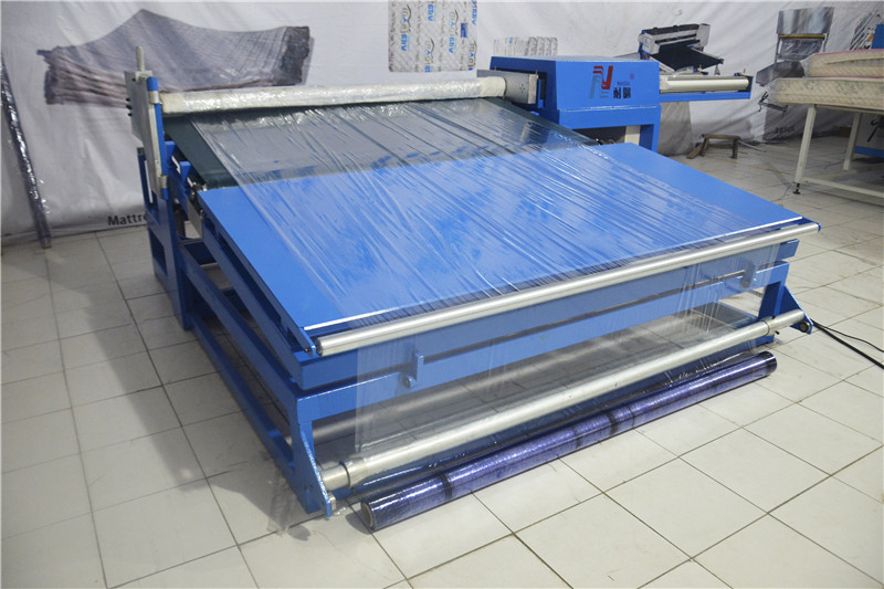 Semi-automatic mattress roll packing machine